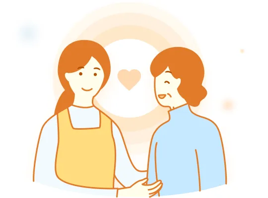 介護従事者と利用者の間にハートがある。